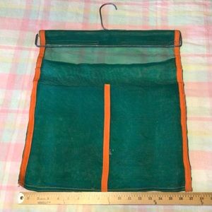Vintage Hanging mesh bag with three separate pockets.